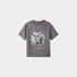 Gray t-shirt with a graphic design on a light gray background